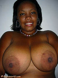 Chantal by the washstand with beautiful big natural breasts