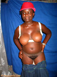 Cony with skirt down showing natural lips and bush